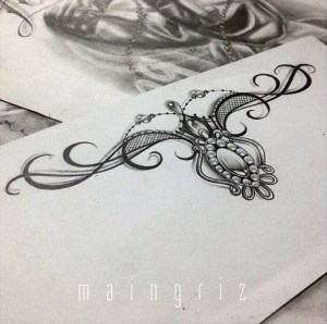 Lace garter tattoo design for woman created by Maingriz.com