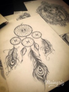 Dreamcatcher tattoo with feathers for woman created by Maingriz.com